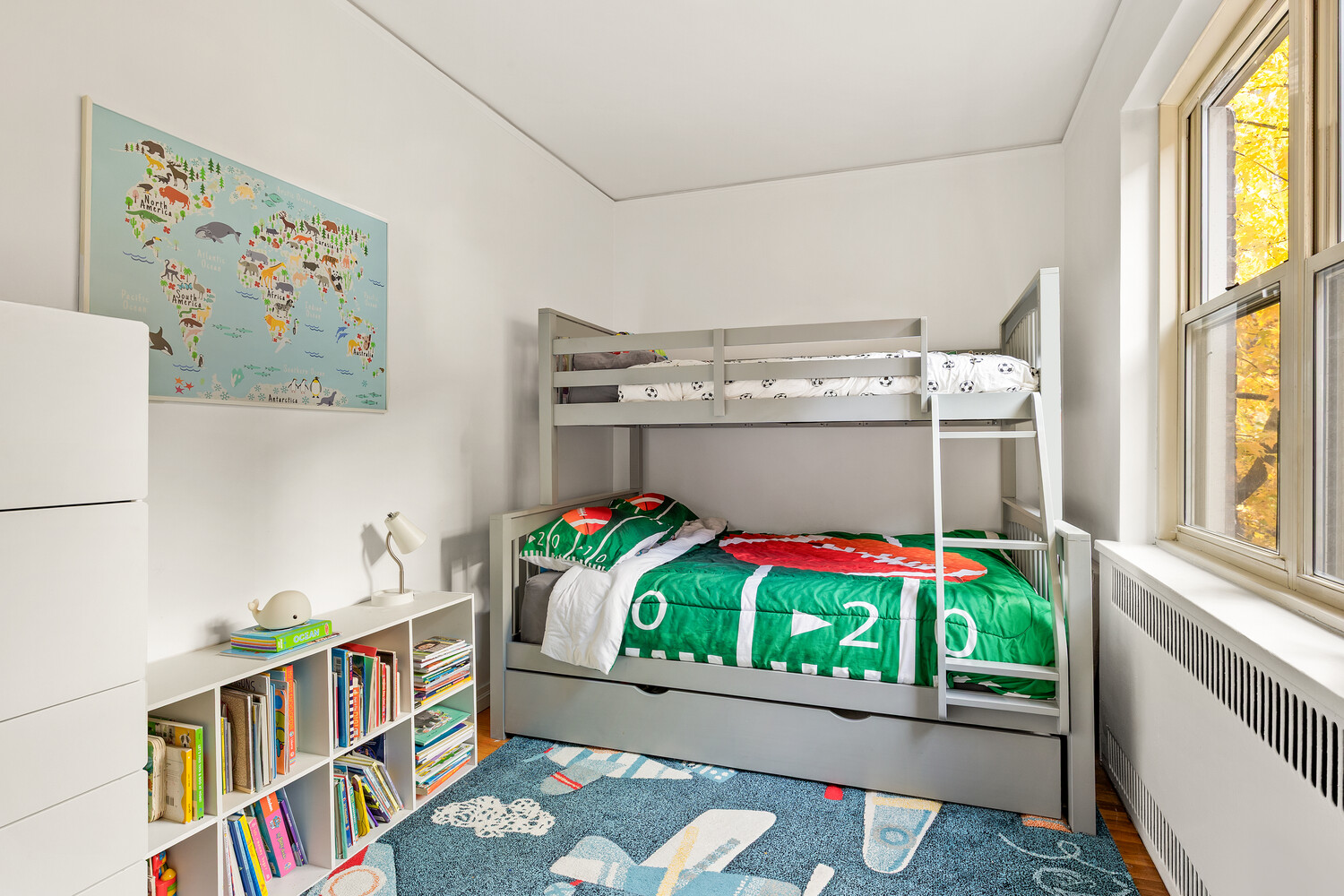 530 East 90th Street, Unit 5H Manhattan, NY 10128 - Photo 13 of 15 a living room with furniture and a table