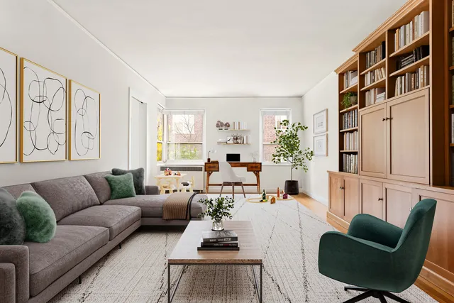a living room with furniture and a table