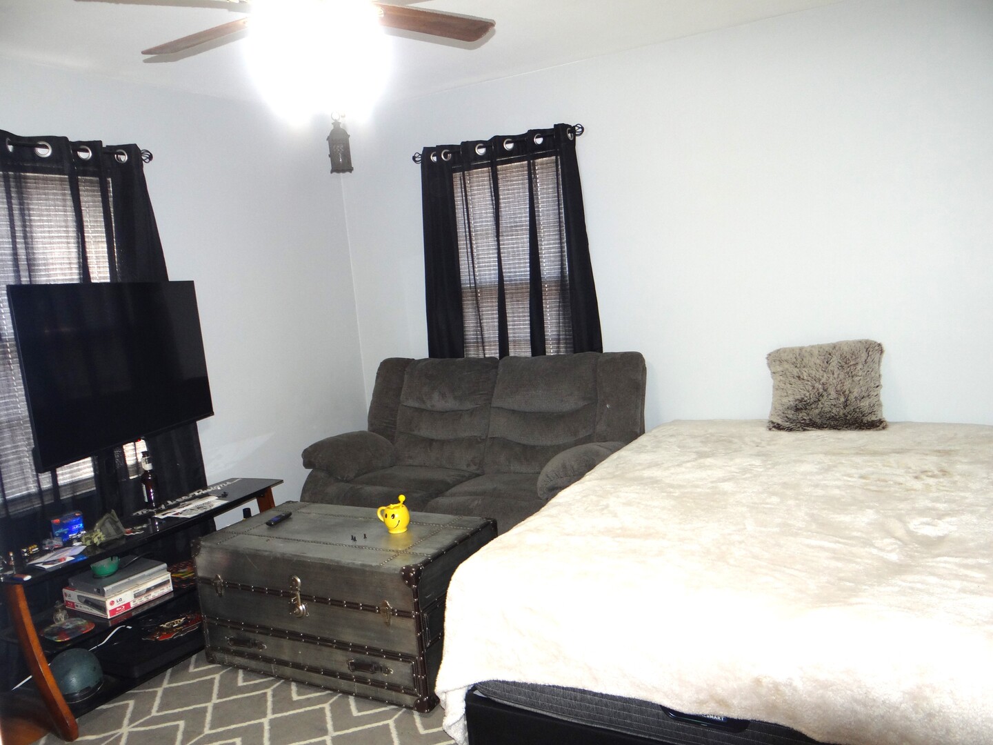 831 Douglas Street Morris, IL 60450 - Photo 6 of 18 a bedroom with a bed and a mirror