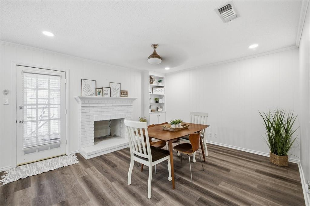 907 Roaring Springs Road Fort Worth, TX 76114 - Photo 17 of 27 a view of a livingroom with furniture and a fireplace
