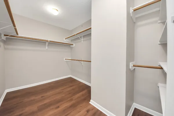 a view of an empty walk in closet