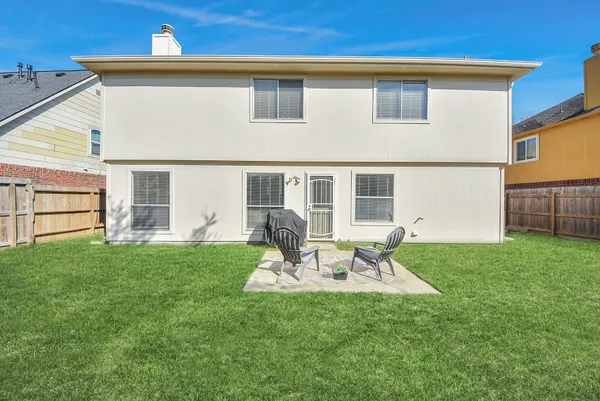 a house view with a garden space
