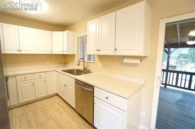 a view of porch with wooden floor
