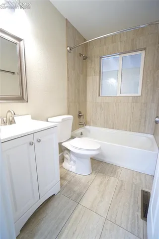 a bathroom with a sink and a toilet