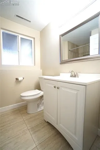 a view of backyard with wooden deck