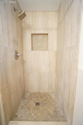 a view of backyard with deck and wooden floor