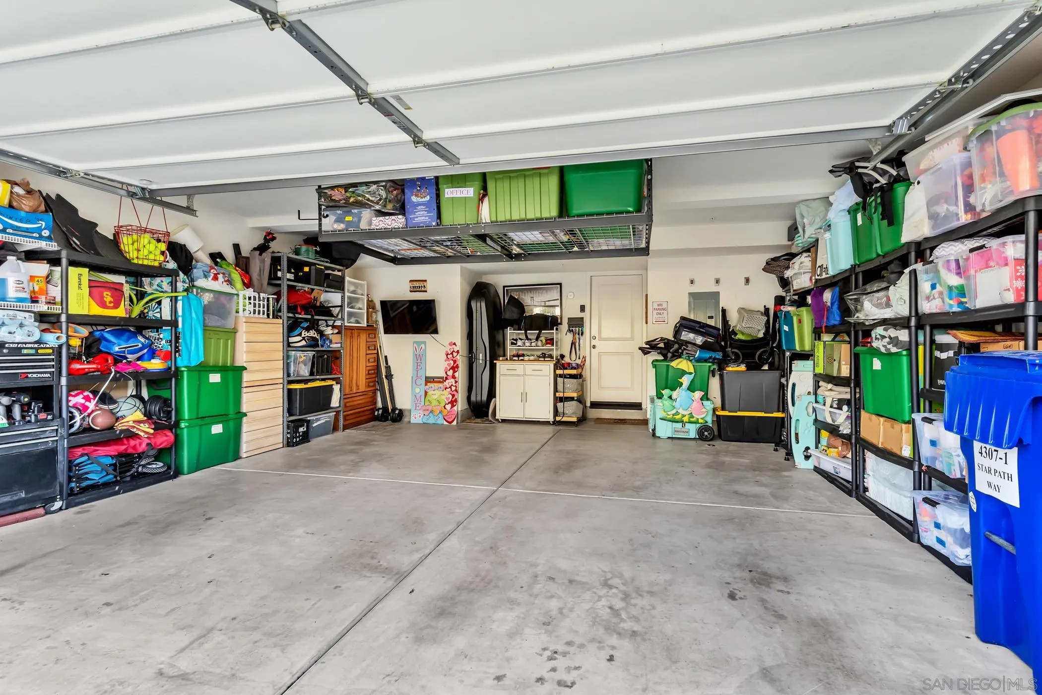 4307 Star Path Way, Unit 1 Oceanside, CA 92056 - Photo 19 of 34 a view of garage