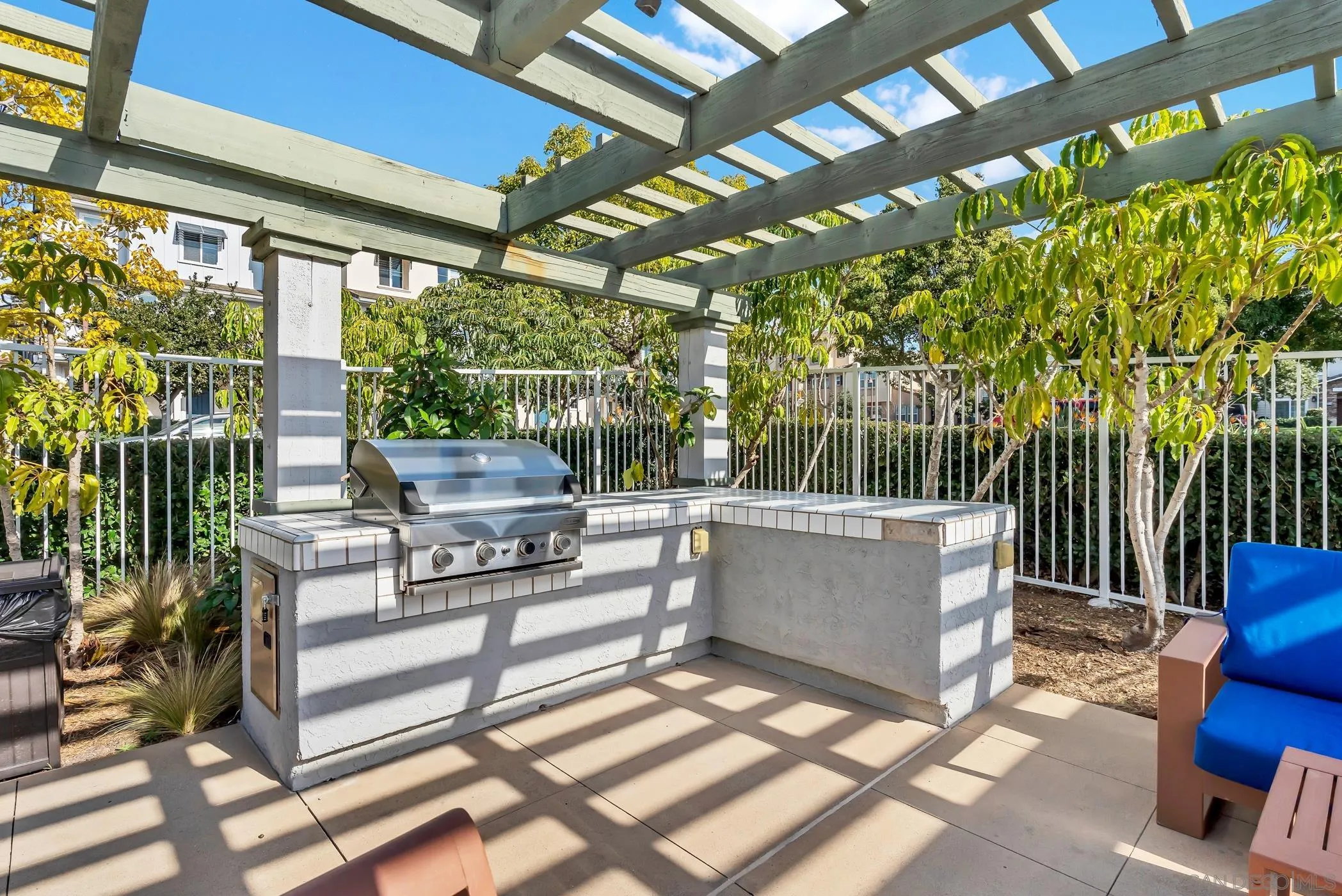 4307 Star Path Way, Unit 1 Oceanside, CA 92056 - Photo 24 of 34 a view of a couches and table in the patio