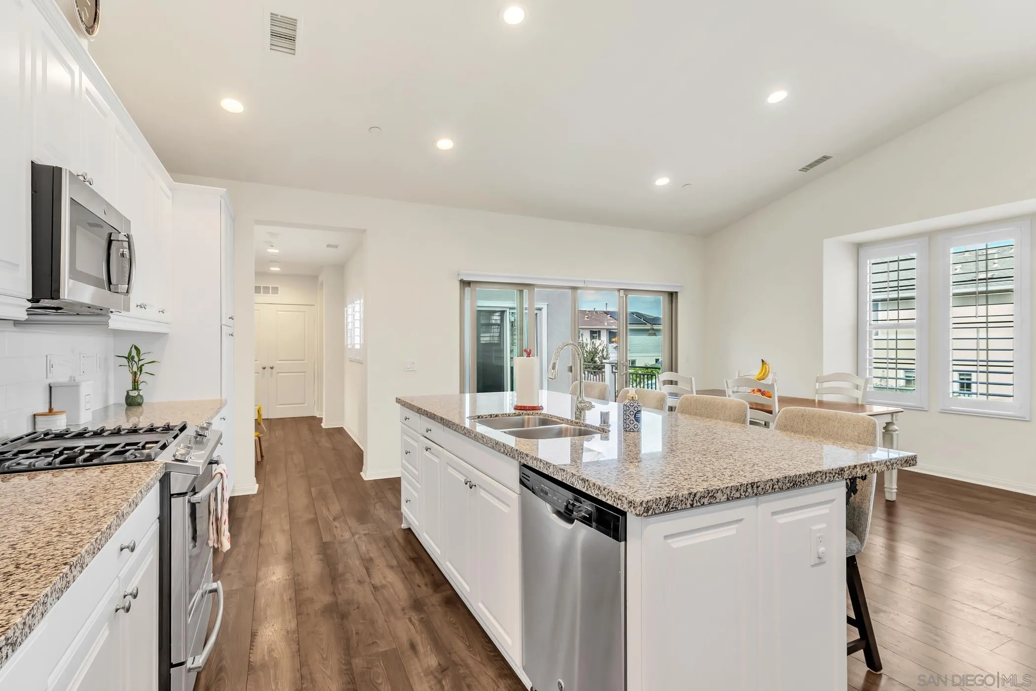 4307 Star Path Way, Unit 1 Oceanside, CA 92056 - Photo 5 of 34 a kitchen with sink stove and refrigerator