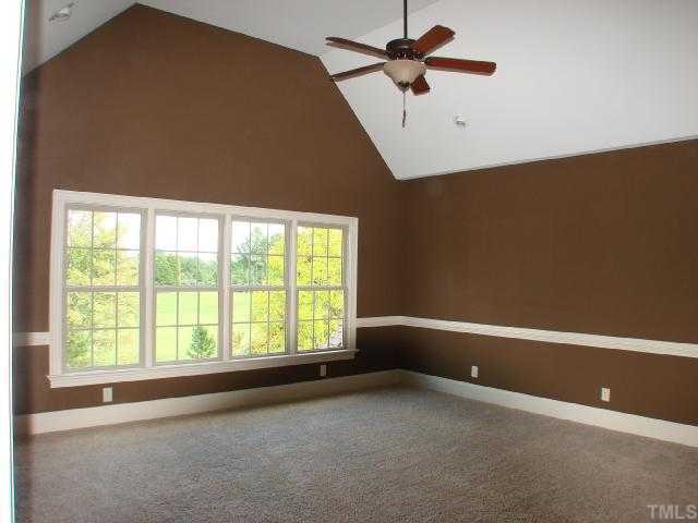 12562 Village Springs Road, Unit LOT3 Raleigh, NC 27614 - Photo 11 of 12 Second Floor TV room or play room with a view of the 17th fairway of the TPC at Wakefield Plantation