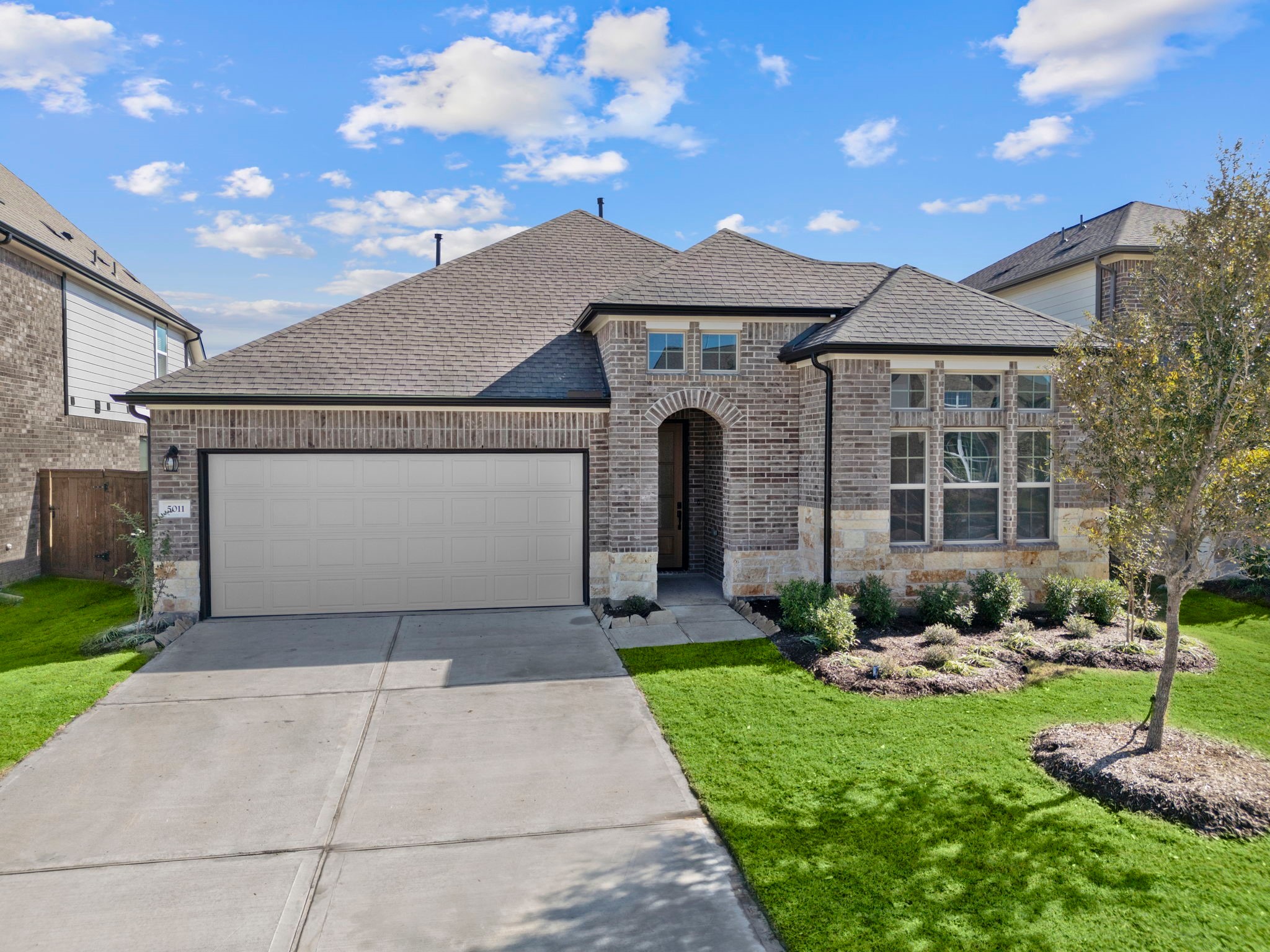 Welcome home to 5011 Jackson Robert Path located in the community of Brookwater and zoned to Lamar CISD.