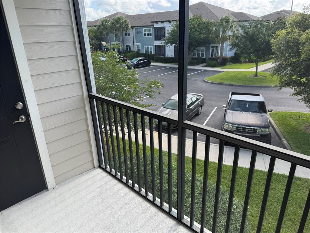 2420 Ann Rou Road, Unit 201 Tavares, FL 32778 - Photo 25 of 25 a view of a porch with a yard