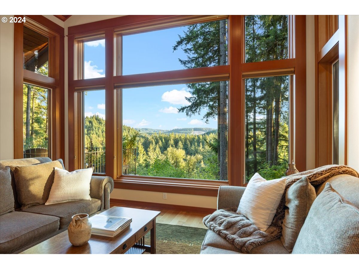 18650 South Lyons Road Oregon City, OR 97045 - Photo 11 of 47 a living room with furniture and a large window