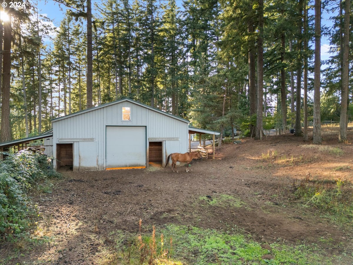 18650 South Lyons Road Oregon City, OR 97045 - Photo 40 of 47 a view of a house with a yard
