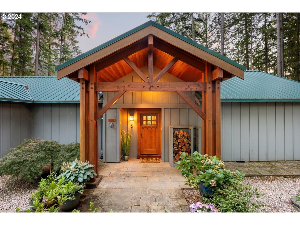 18650 South Lyons Road Oregon City, OR 97045 - Photo 5 of 47 a view of a house with a yard porch and furniture