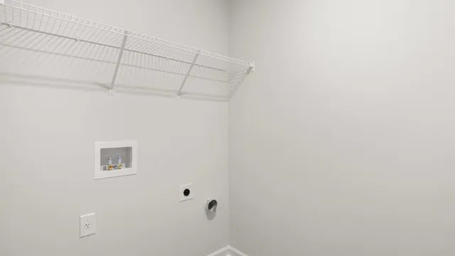 a sign that is sitting on a brick wall