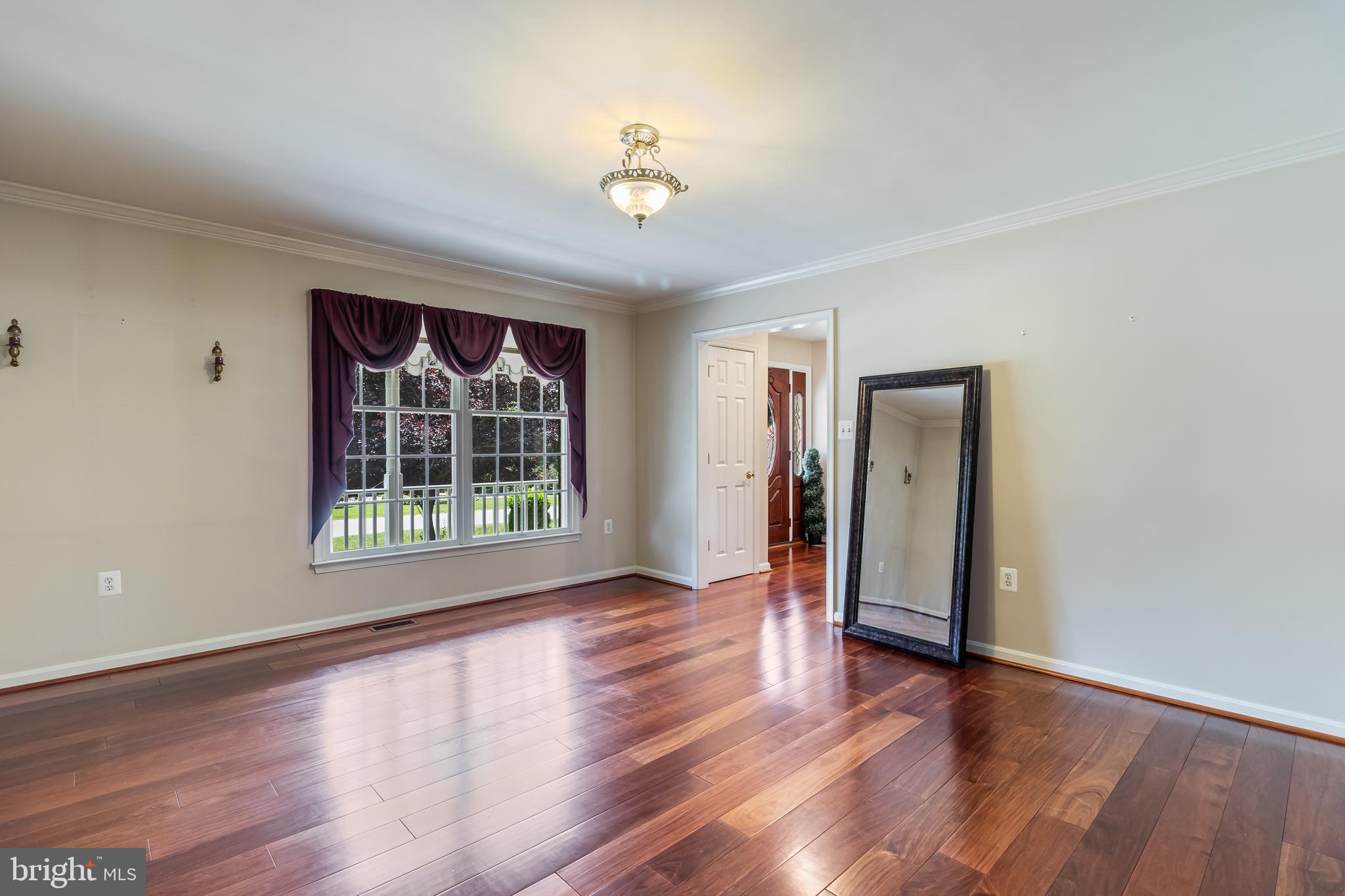 203 Morgans Ridge Court La Plata, MD 20646 - Photo 38 of 59 a view of livingroom with window hardwood floor and cabinet