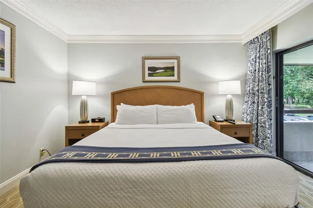 a table and chairs in a room next to a window