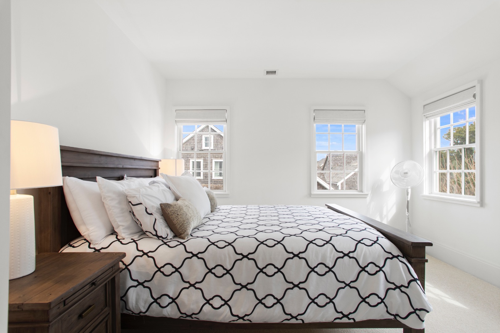 2 Blazing Star Road Nantucket, MA 02554 - Photo 28 of 47 a bedroom with a bed and wooden floor