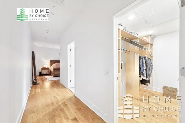 a view of a bedroom from a hallway