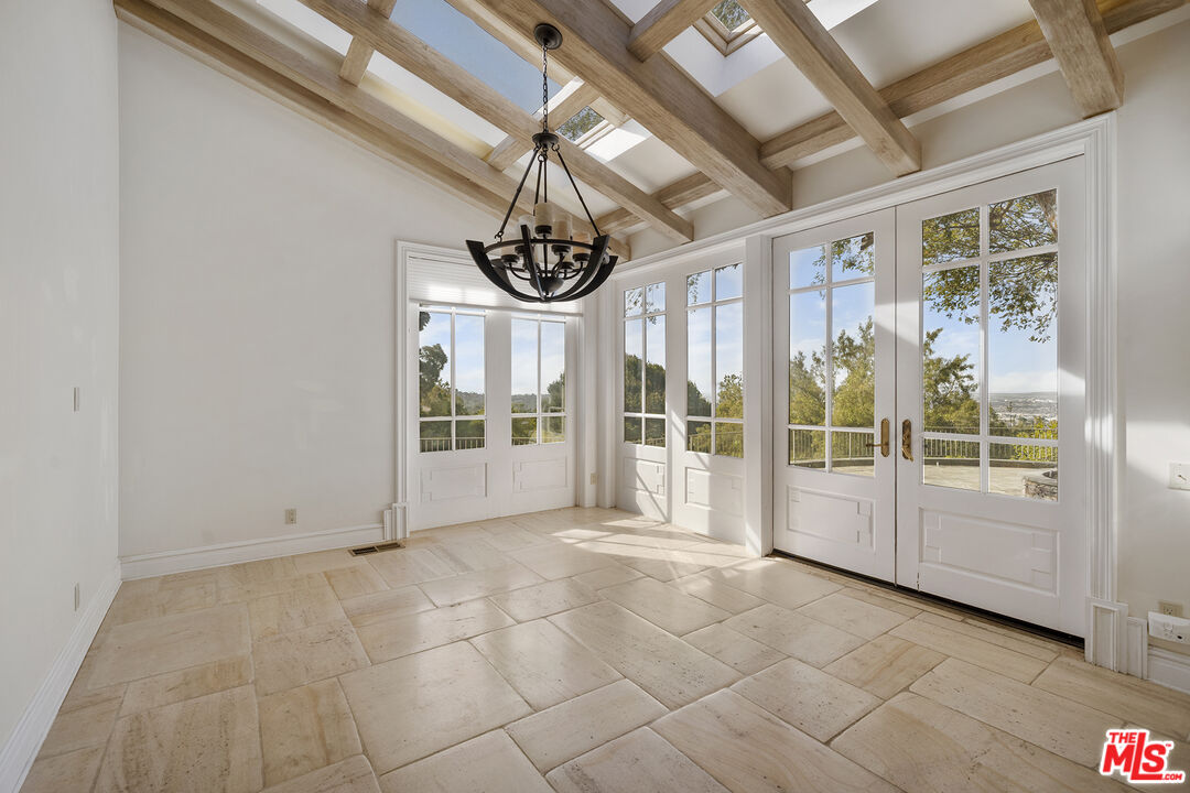 74 Saddleback Road Rolling Hills, CA 90274 - Photo 14 of 65 a view of an empty room with windows