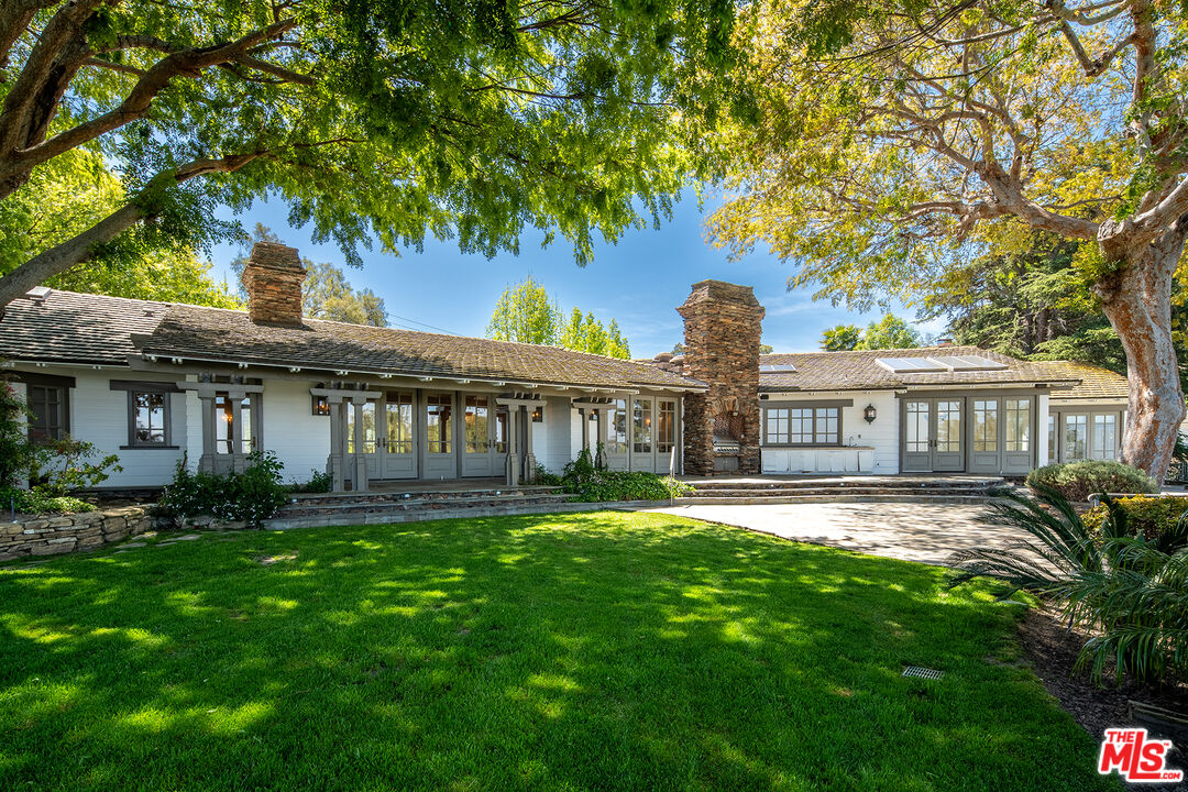 74 Saddleback Road Rolling Hills, CA 90274 - Photo 53 of 65 a front view of a house with garden