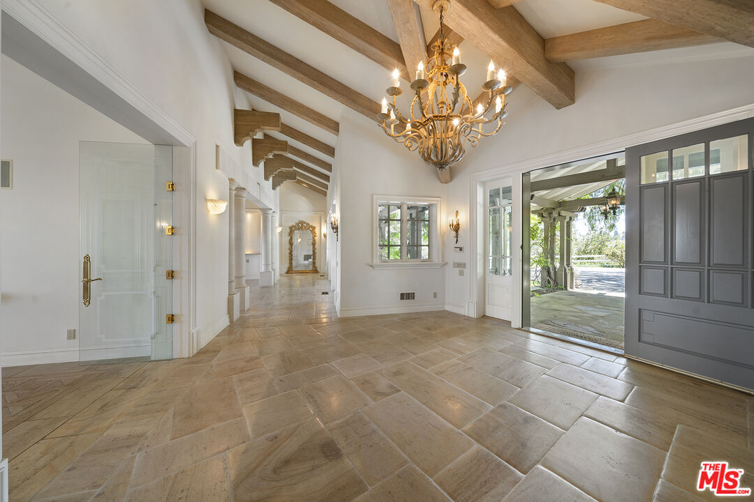 74 Saddleback Road Rolling Hills, CA 90274 - Photo 6 of 65 a view of a big room with windows