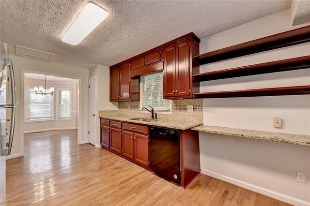 a big yard with lots of green space and deers