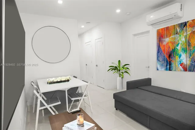 a workspace with furniture and screen