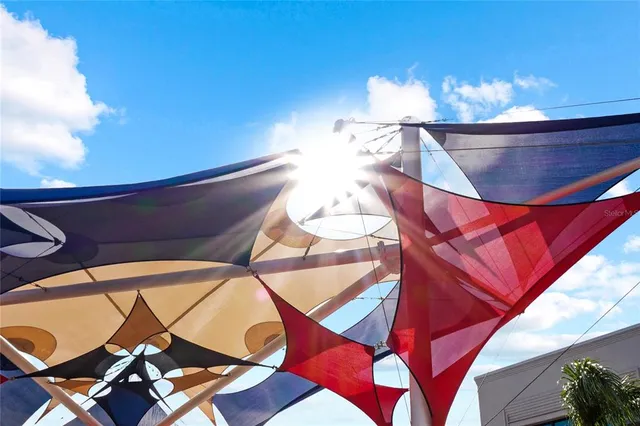 an aerial view of a house with a lake view