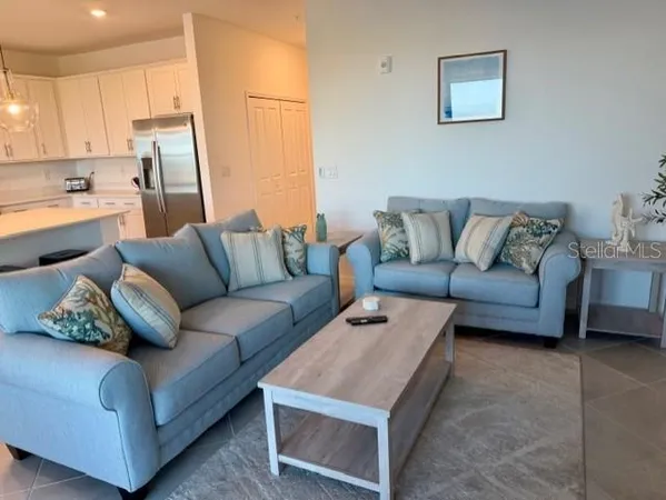 a living room with furniture and a couch