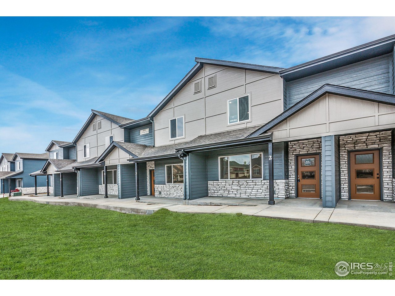 6721 4th St Road, Unit 2 Greeley, CO 80634 - Photo 1 of 39 EXTERIOR (VIRTUALLY STAGED LANDSCAPING)