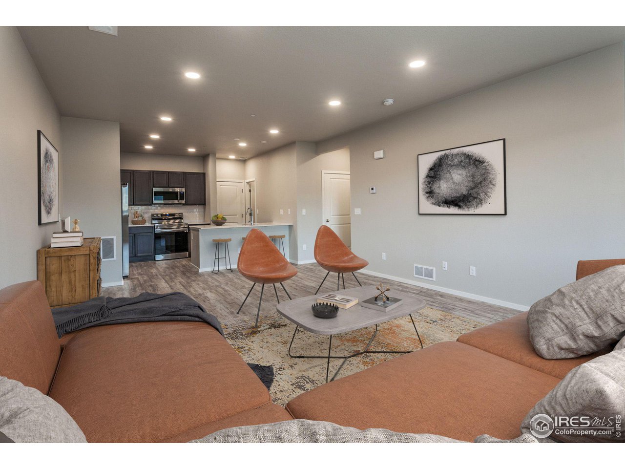 6721 4th St Road, Unit 2 Greeley, CO 80634 - Photo 4 of 39 LIVING ROOM & KITCHEN (VIRTUALLY STAGED )