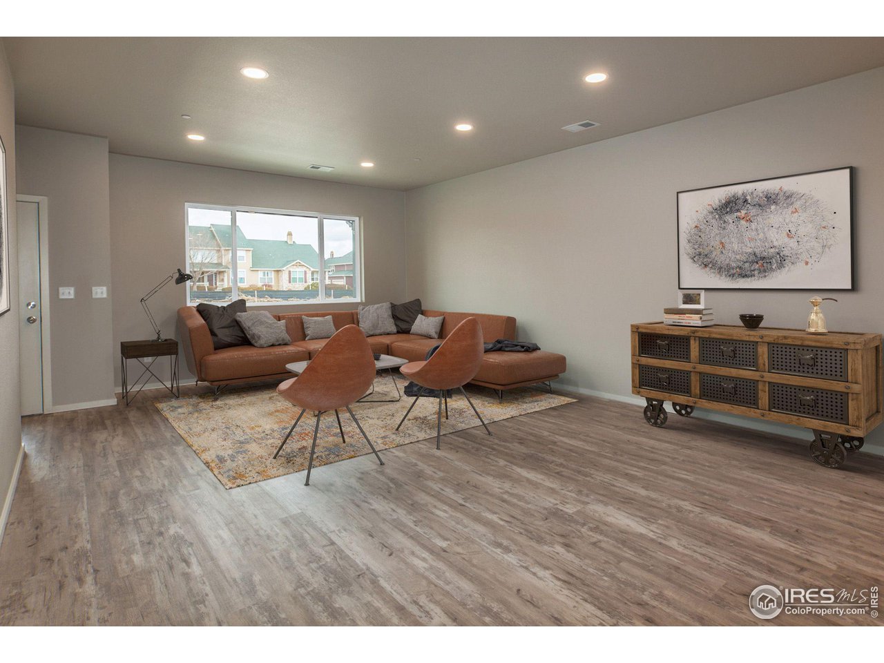 6721 4th St Road, Unit 2 Greeley, CO 80634 - Photo 5 of 39 LIVING ROOM (VIRTUALLY STAGED)