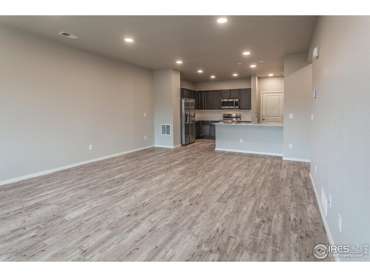 6721 4th St Road, Unit 2 Greeley, CO 80634 - Photo 6 of 39 LIVING, DINING, KITCHEN