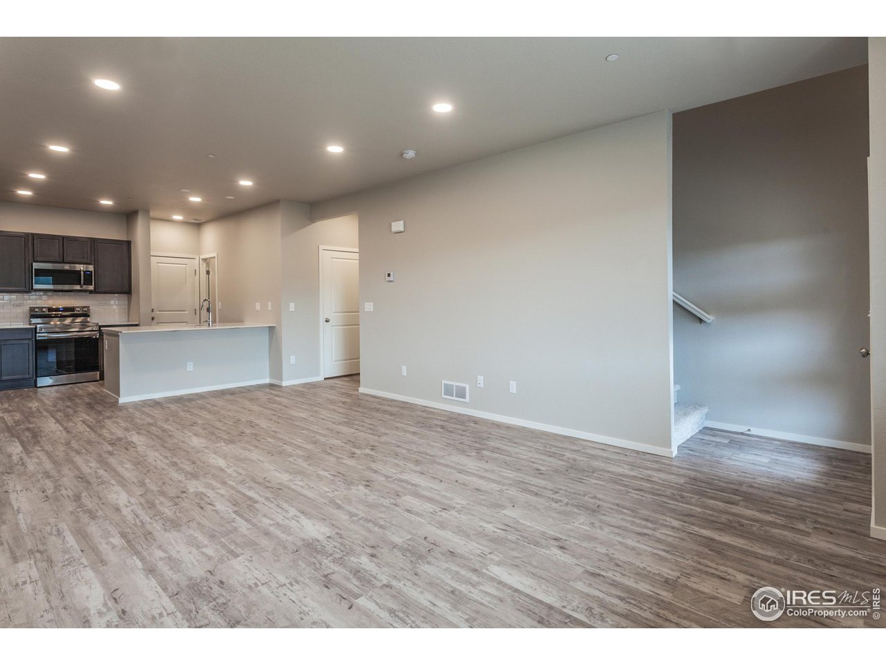6721 4th St Road, Unit 2 Greeley, CO 80634 - Photo 8 of 39 KITCHEN AND DINING ROOM