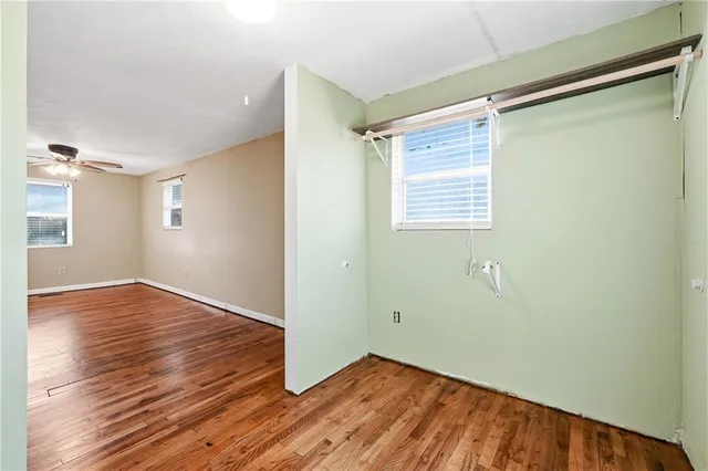 a bathroom with a sink a toilet and shower curtain
