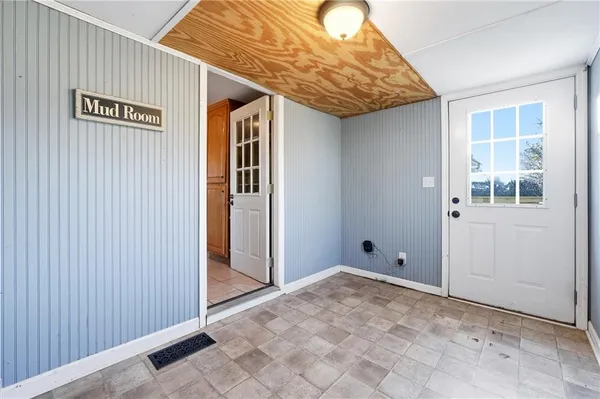 a view of a balcony with wooden floor