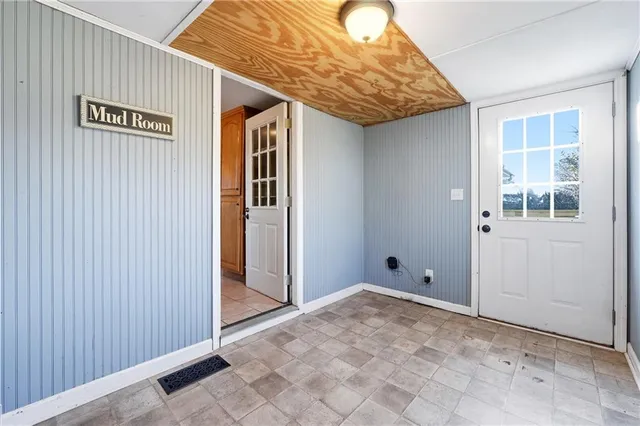 a view of a balcony with wooden floor