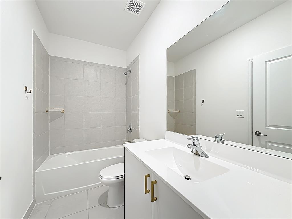 23513 Southwest 127th Place Homestead, FL 33032 - Photo 23 of 43 a bathroom with a sink a toilet and shower