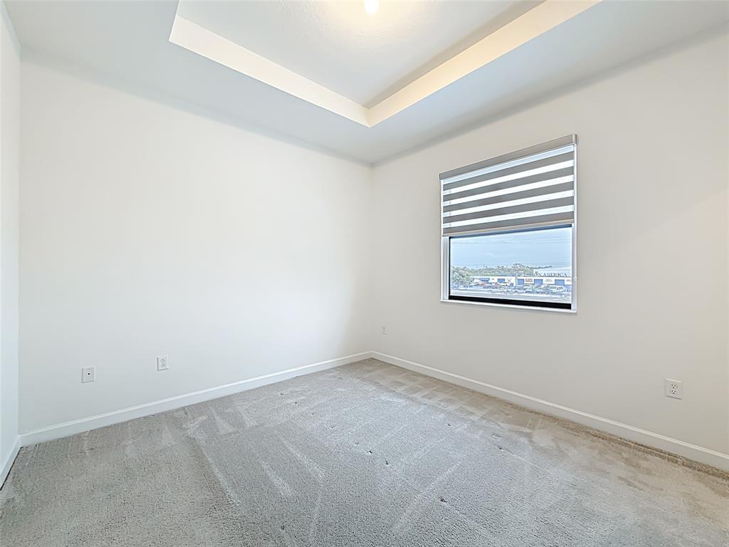 23513 Southwest 127th Place Homestead, FL 33032 - Photo 31 of 43 an empty room with a window
