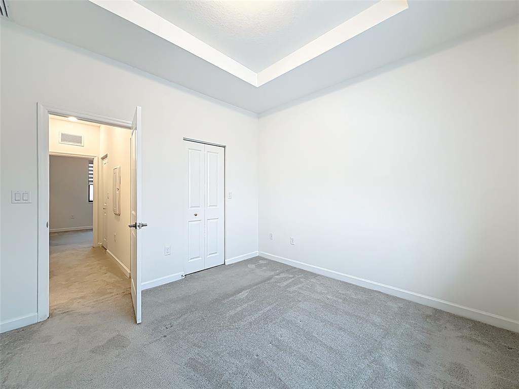 23513 Southwest 127th Place Homestead, FL 33032 - Photo 33 of 43 an empty room with an entryway