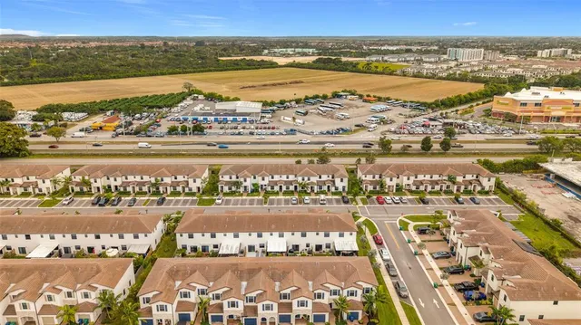a view of a city with an ocean view