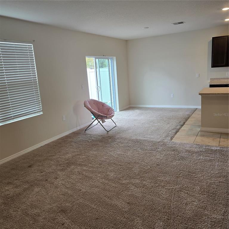 814 Sun Burst Road Winter Haven, FL 33880 - Photo 16 of 48 a view of an empty room with a window