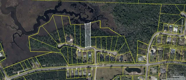 a view of a swimming pool and a yard