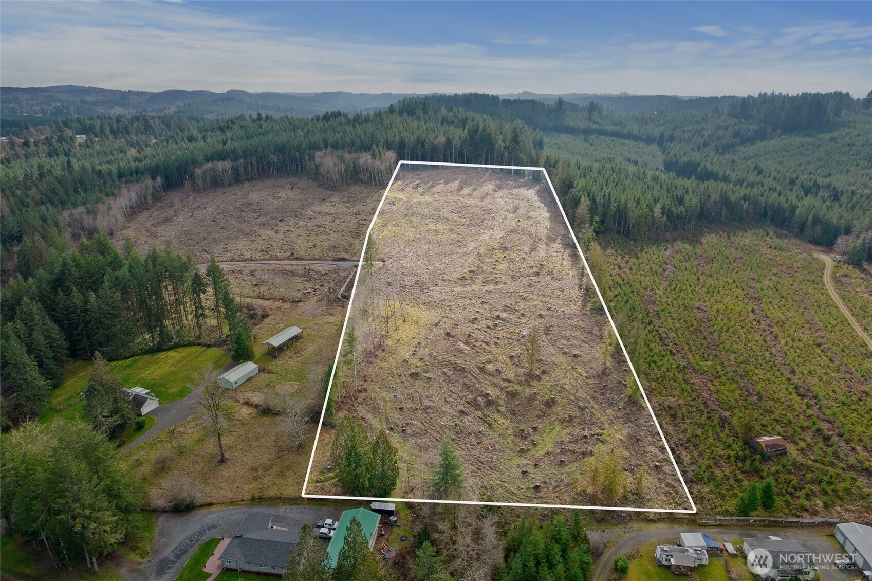 a view of a yard with a lake view