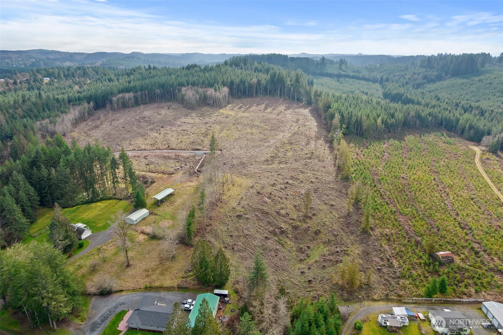 0 Little Hanaford Road, Unit B Centralia, WA 98531 - Photo 5 of 16 a view of a lake with mountain