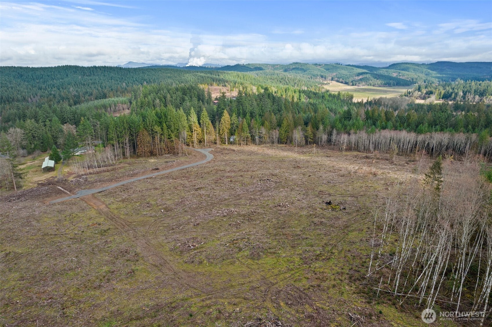 0 Little Hanaford Road, Unit B Centralia, WA 98531 - Photo 10 of 16 a view of a lake with a mountain in the background