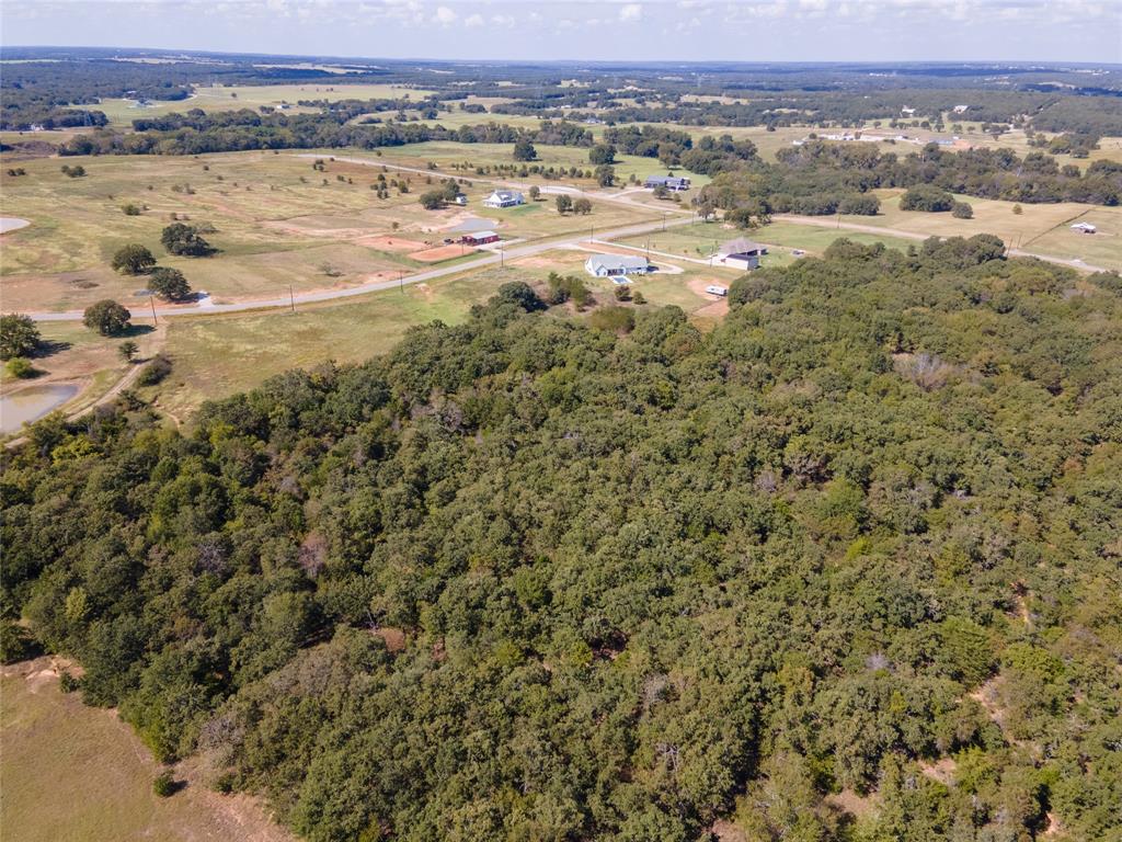 330 Rolling Rnch Boulevard Alvord, TX 76225 - Photo 16 of 21 an aerial view of beach and residential houses with outdoor space