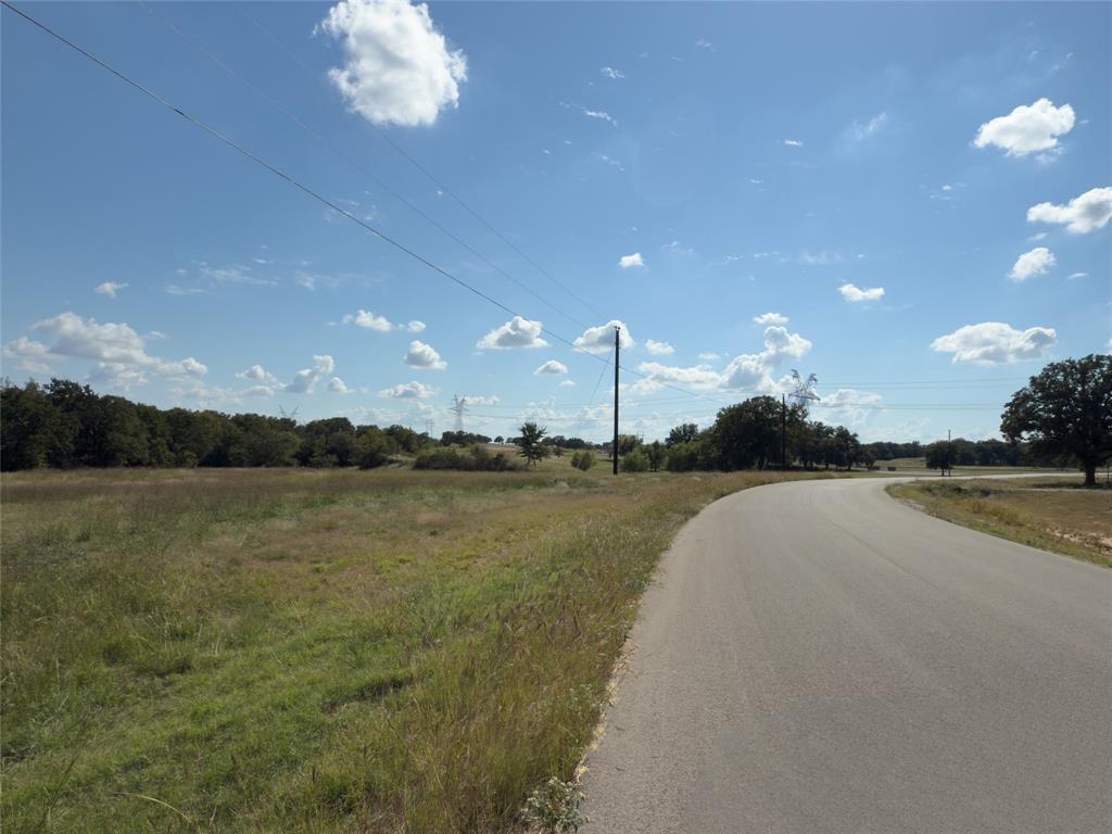 330 Rolling Rnch Boulevard Alvord, TX 76225 - Photo 8 of 21 a view of a lake with a terrace